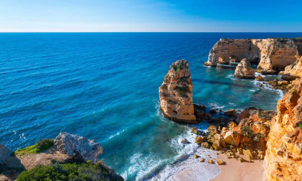 Begin your 7 days in Portugal by exploring the Algarve's beautiful beaches.